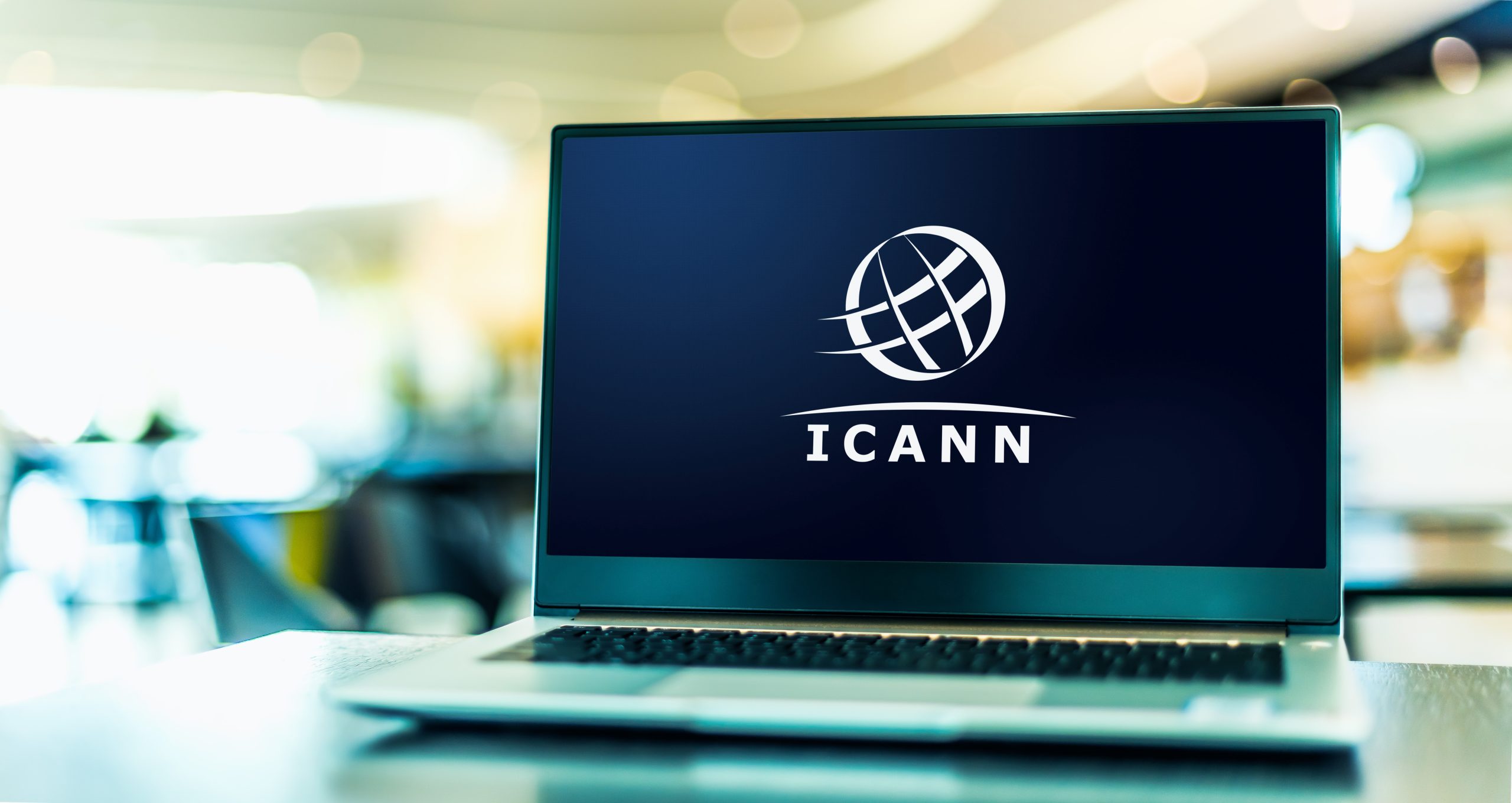 laptop computer displaying logo of icann